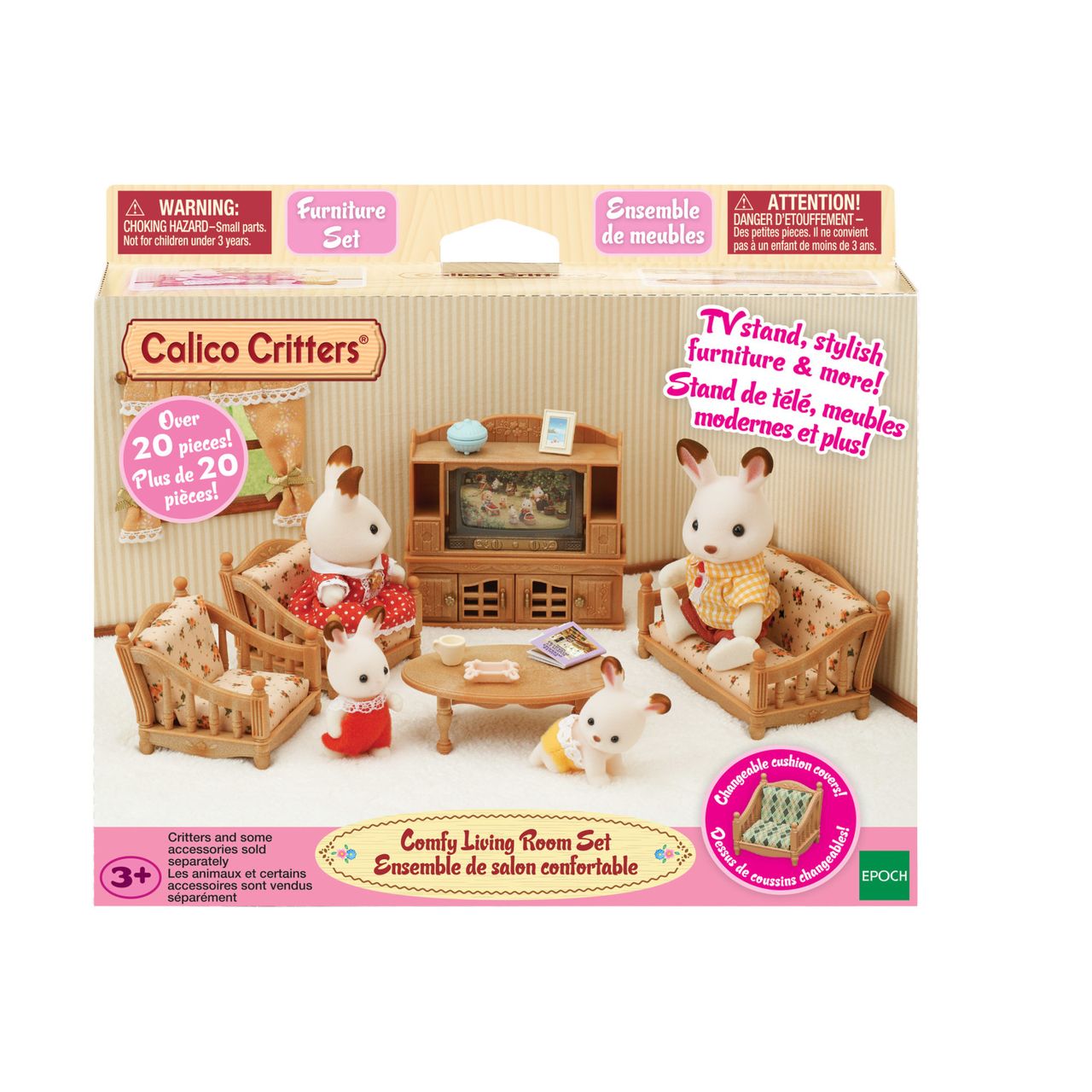 The Calico Critters Comfy Living Room Set box displays adorable rabbit figures with a cozy sofa, armchairs, table, TV stand with TV, and charming accessories arranged in a welcoming living room scene—perfect dollhouse furniture for any Calico Critters collection.