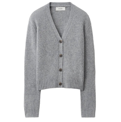 Lisa Yang Marionette Cardigan in gray, featuring a V-neckline, long sleeves, and ribbed cuffs and hem, displayed on a white background.