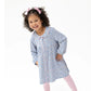 A young girl with curly hair and pink bows smiles in the Angel Dear Baby Girls' and Girls' Jill Dress and Bloomer, styled with light pink tights, against a plain white background.