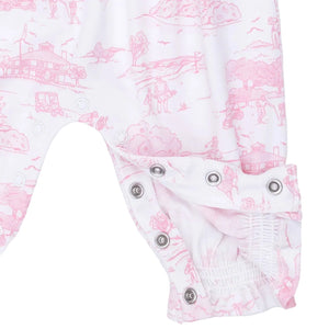 Close-up of the Angel Dear Baby Girls’ Smocked Long Sleeve Romper, showcasing a white fabric adorned with pink toile print, silver snap buttons lining the inseam, elastic leg openings, and a charming Peter Pan collar.