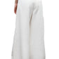 Model wearing TWP Dee's Linen Trouser—a relaxed fit, wide-leg white cotton linen style—paired with a beige cropped top, shown from the back against a plain white background.