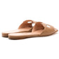 The Lido Sandal by Rupert Sanderson is a pair of tan Cremino Calf leather slides, handmade in Italy, featuring open toes, cut-out strap detailing, and flat wooden soles.