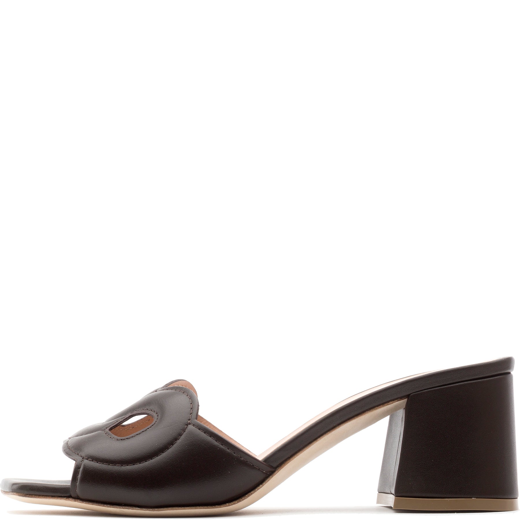 The Rupert Sanderson Laguna Heel is a black, open-toe sandal with a chunky block heel and cut-out upper strap, handmade in Italy and shown in profile.