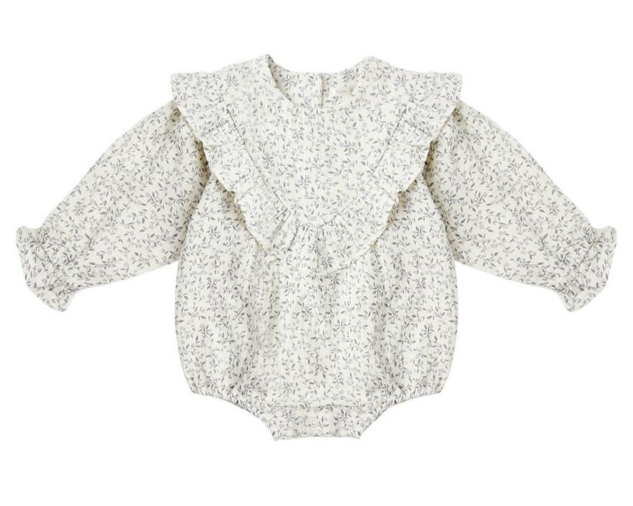 The Rylee & Cru Baby Girls' Winnie Romper showcases a charming floral print, ruffled shoulders, elastic cuffs, and a bubble silhouette with bottom snaps, displayed flat on a white background.