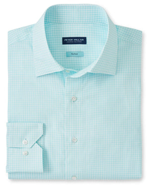 A neatly folded light blue checkered, long-sleeved dress shirt with a tailored fit and buttons, labeled "Peter Millar," showcases the Flex Finish of the Peter Millar Renato Cotton Sport Shirt.