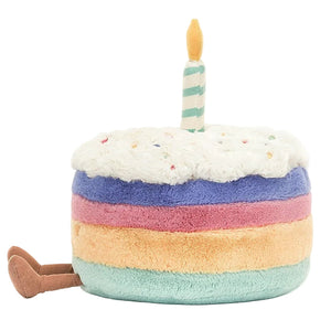 Amuseable Rainbow Birthday Cake, complete with a lit candle, by Jellycat