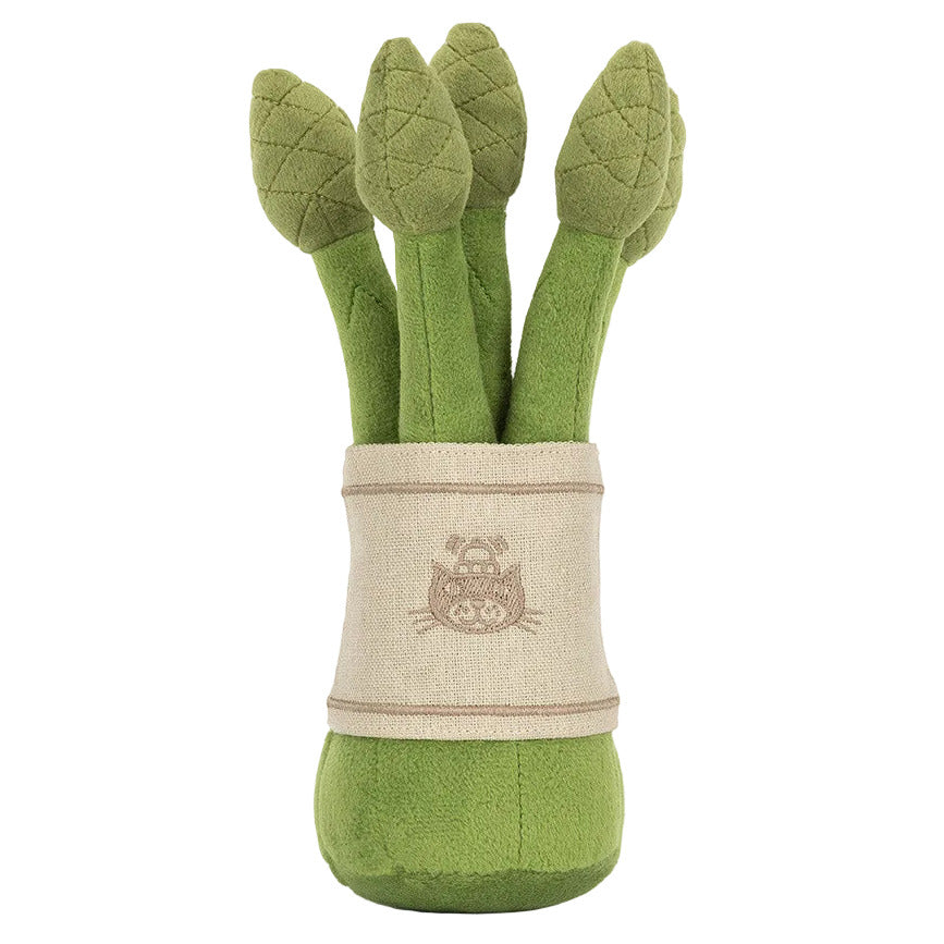 Jellycat’s Amuseables Asparagus is a plush toy shaped like asparagus spears bundled in beige cloth with a cute cat face, inspired by their whimsical collection.