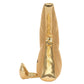 A yellow and tan Jellycat Amuseables Zapperty Lightning Bolt plush toy, shaped like a stylized elongated lightning bolt, shown upright with one end resting on the surface.