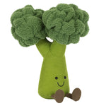 The Jellycat Amuseables Broccoli is a plush toy shaped like a broccoli stalk with two fluffy green heads, a smiling face, and cute brown fabric legs.