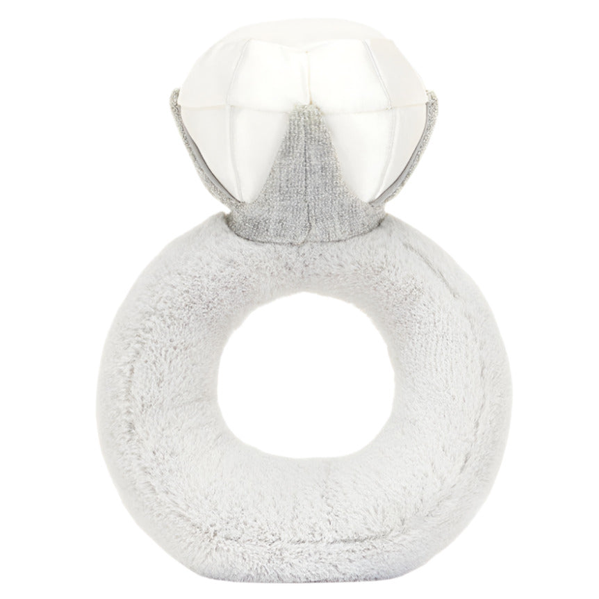 The Jellycat Amuseables Diamond Ring is a plush toy shaped like a diamond ring, with a soft grey band and white fabric diamond—an adorable, whimsical gift inspired by vintage boutique finds.