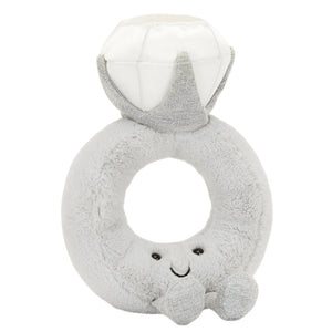The Jellycat Amuseables Diamond Ring plush, featuring a smiling face and small arms, is perfect for playful proposals or adding whimsical charm to your vintage boutique.