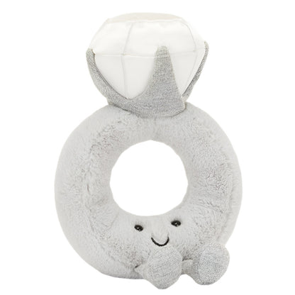 The Jellycat Amuseables Diamond Ring plush, featuring a smiling face and small arms, is perfect for playful proposals or adding whimsical charm to your vintage boutique.
