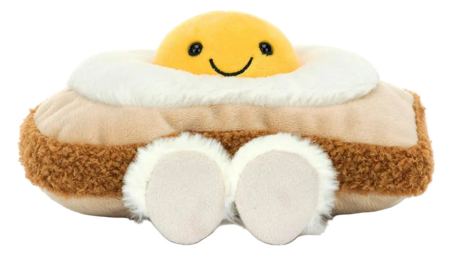 The Jellycat Amuseables Egglantine Egg on Toast is a plush toy with soft, fuzzy textures, neutral colors, and cute white feet—bringing cozy charm to any collection.