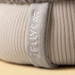 Close-up of a beige ribbed fabric with a soft “Jellycat” tag—ideal for gifting or adding to your Amuseables Pomilly collection.
