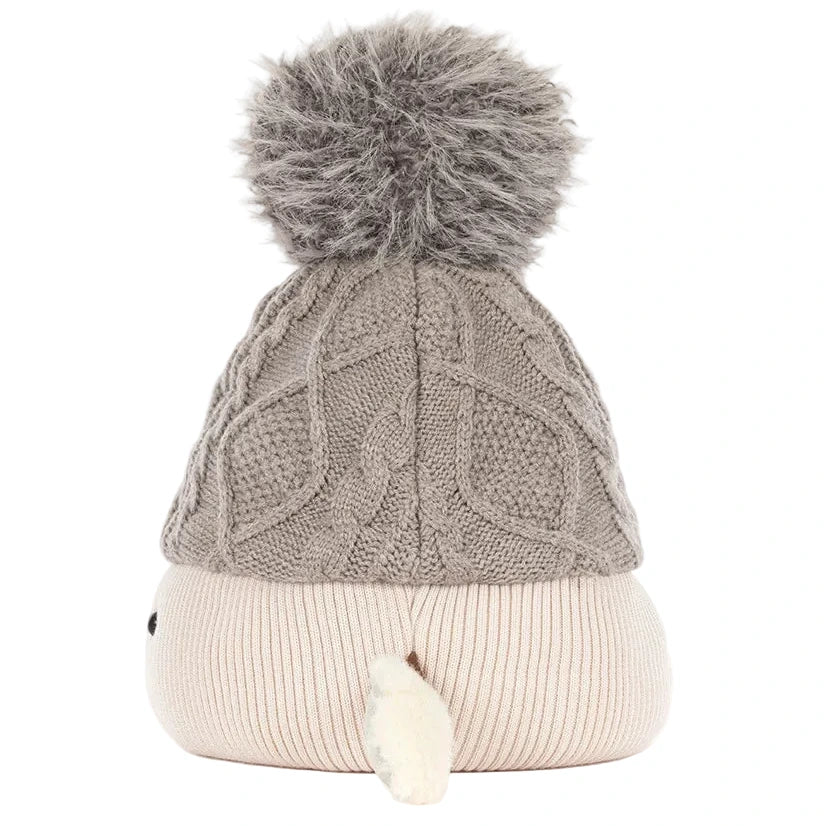 Amuseables Pomilly by Jellycat: a beige plush toy with a tiny tail and gray knit hat—ideal for festive Christmas party décor.