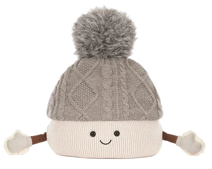 Jellycat Amuseables Pomilly plush toy features a smiling face, gray knit hat with pom-pom, and white mittened arms—perfect for a cozy Christmas party.