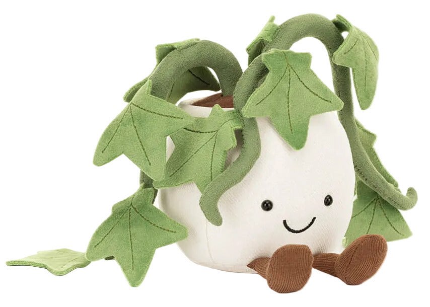 The Jellycat Amuseables Ivy is a plush toy shaped like a white flowerpot with brown feet, green fabric leaves, and a smiling face—making it an adorable friendship gift.