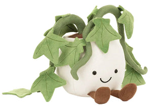The Jellycat Amuseables Ivy is a plush toy shaped like a white flowerpot with brown feet, green fabric leaves, and a smiling face—making it an adorable friendship gift.