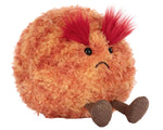 The Jellycat Amuseables Planet Mars is a round, fluffy orange plush toy with red tufted eyebrows, a sad face, and small brown legs shown on a white background.