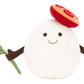 The Amuseables Mozzarella by Jellycat is a white egg-shaped plush with a smiling face, brown arms, a green leaf, and a red mushroom cap—an adorable cheese gift for any plush fan.