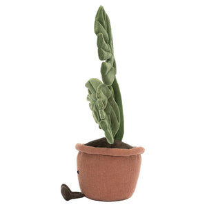 The Amuseables Monstera Plant by Jellycat is a plush toy shaped like a green monstera leaf growing from a terracotta pot, featuring small black eyes and a simple smile—an adorable companion for any office space.
