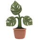 The Jellycat Amuseables Monstera Plant is a plush toy with three big green leaves and a soft brown pot, perfect for adding charm to any desk.