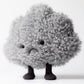 The Jellycat Amuseables Storm Cloud is a plush toy shaped like a fluffy gray cloud with a sad face and short legs, making it a unique and adorable gift for cuddly toy lovers.