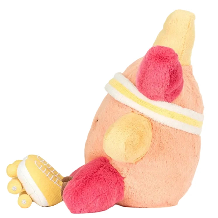 Jellycat's Amuseables Sun 'Roller Skates' is a plush toy featuring a round, peach sun wearing a yellow and white headband, pink wings, and yellow roller skates, perfect for boardwalk skating fun and sitting upright.