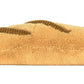 The Jellycat Amuseables Caprese Baguette is a plush toy shaped like a loaf of bread with a light brown color and dark brown textured lines on top.
