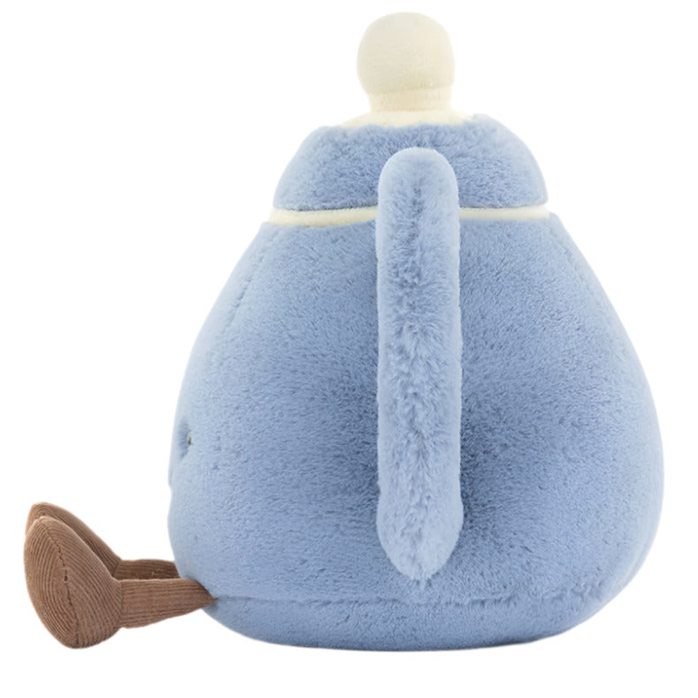 The Jellycat Amuseables Vicky Teapot in blue fur, featuring a white lid and brown spout, is a charming side-view plush companion for teatime.