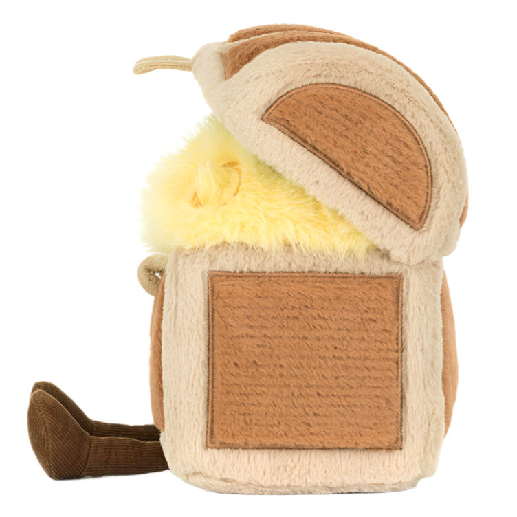 The Jellycat Amuseables Treasure Chest plush toy features a soft, fuzzy yellow interior, brown crust details, and a cute fabric tail peeking out—perfect for imaginative adventures.