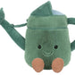 The Jellycat Amuseables Watering Can is a green plush toy with a smiling face, black eyes, two brown feet, plus a spout and handle.