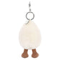 The Amuseables Happy Boiled Egg Bag Charm by Jellycat features a fluffy, egg-shaped design with brown knitted legs and a silver keyring on top.
