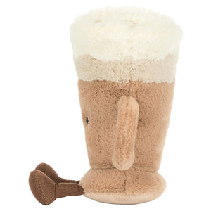 The Jellycat Amuseables Latte is a soft plush toy shaped like a latte mug, featuring a light brown body, white foam top, side handle, and small brown tail.