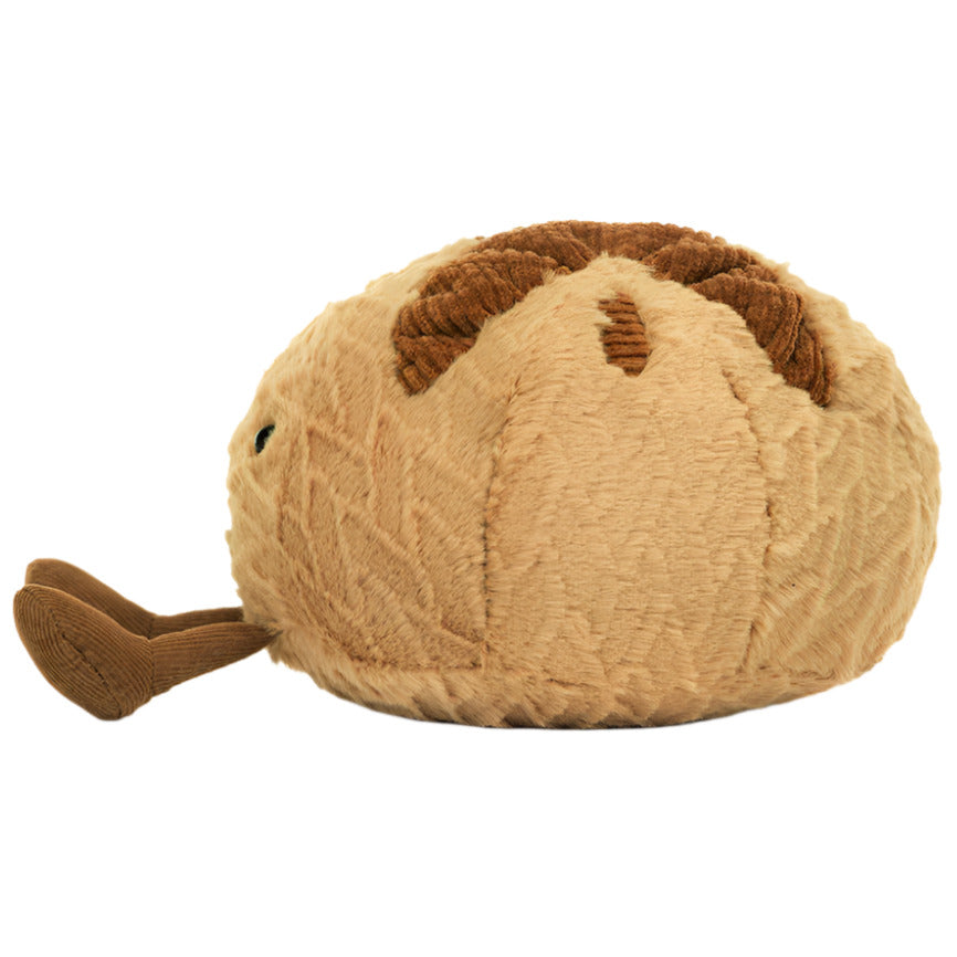 A round, brown plush from Jellycat, Amuseables Sourdough features a whimsical beak and minimal face—making it the perfect gift for anyone who loves unique and cuddly companions.