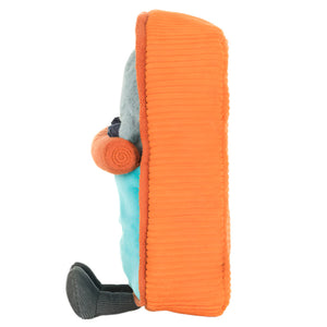 A side view of Jellycat's Amuseables Sardine Tin plush toy—featuring an orange ribbed rectangle, light blue section, and black feet—perfect for collectors and fans of this colorful design.