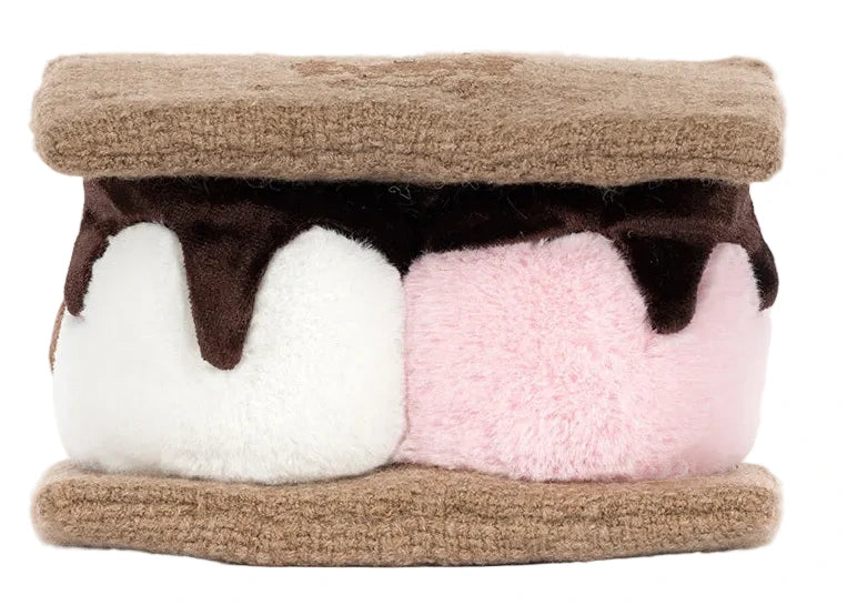 The Jellycat Amuseables S'mores plush is shaped like a s’more, with tan cookie layers, white and pink marshmallow centers, and dark brown chocolate details—an adorable campfire companion.