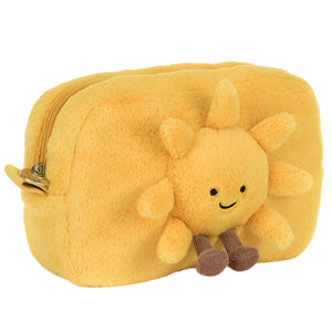 The Jellycat Amuseables Sun Pouch is a yellow fur pouch shaped like a smiling sun, featuring soft rays and brown feet on the front—perfect as a cheerful, portable accessory.