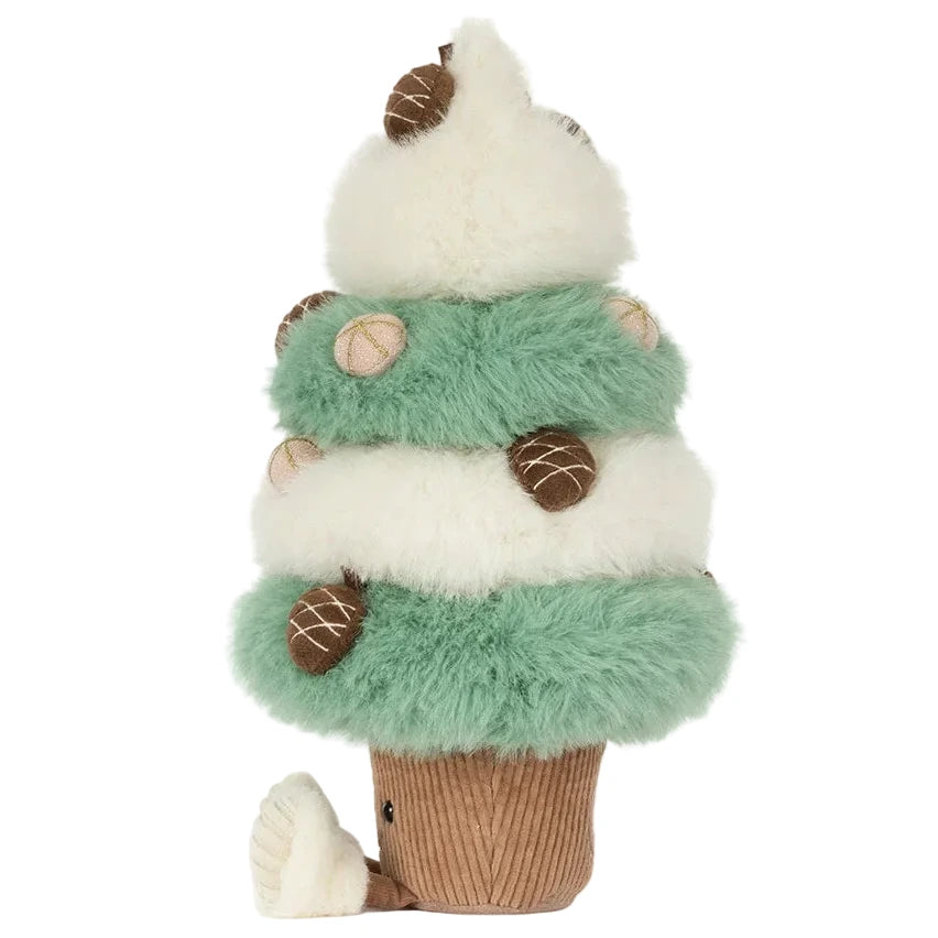 A Jellycat Amuseables Pinecone Tree plush with alternating green and white fuzzy tiers, decorated with embroidered pinecones and set in a brown ribbed pot base with two small feet.