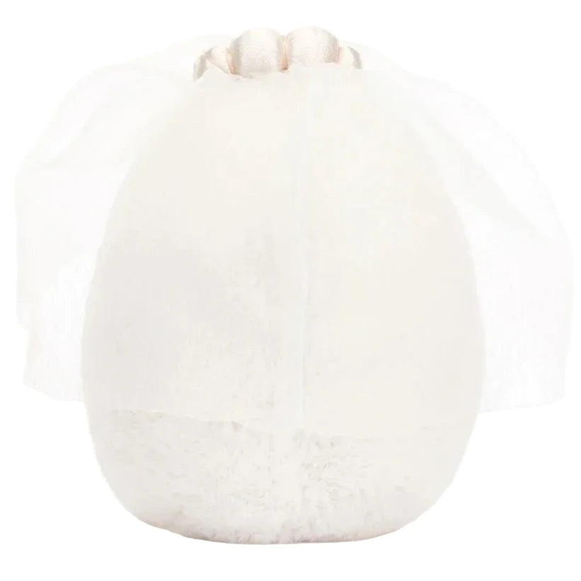 The Jellycat Amuseables Boiled Egg Bride is a plush toy with a white, egg-shaped design, topped with a sheer veil and metallic detail.