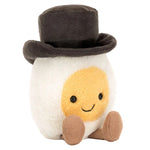 Bring home the Jellycat Amuseables Boiled Egg Groom plush, featuring a smiling face, brown feet, and a smart black top hat.