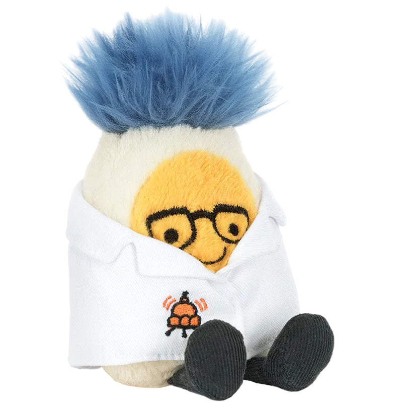 Jellycat’s Amuseables Boiled Egg Scientist Outfit features a plush toy with blue hair, black glasses, embroidered lab coat with turtle icon, and black feet—an adorable addition to your collection of cosmic companions.
