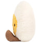 Plush toy shaped like a half-peeled banana with a yellow face, white outer layer, and brown bottom, shown from the side—this cheerful Jellycat creation is as playful as the Amuseables Boiled Egg Happy by Jellycat.