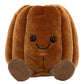 Meet Amuseables Carole Canele by Jellycat—a soft, cuddly plush shaped like a brown canele pastry, featuring a smiling face, black button eyes, and little brown feet.