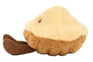 The Jellycat Amuseables Margaux Madeleine is a plush toy shaped like a madeleine cake, with a soft textured design by Jellycat.