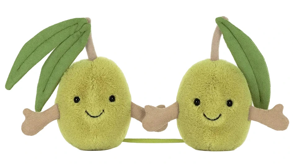Jellycat’s Amuseables Pair of Olives are plush green companions with smiling faces, soft brown arms holding hands, and leafy tops—perfect best friend plushies for fun and friendship!.