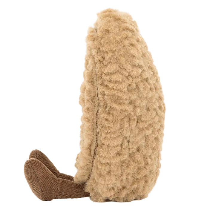 A Jellycat Amuseables Philippe Palmier plush toy shown from the side, featuring a furry tan body and brown corduroy feet.