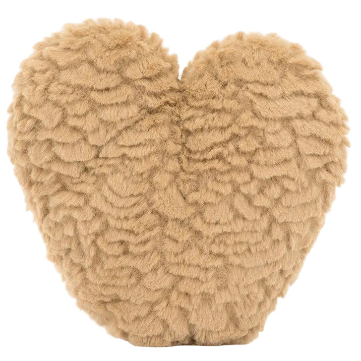 The Jellycat Amuseables Philippe Palmier is a heart-shaped pillow with soft, tan textured faux fur, inspired by signature Jellycat plush toy designs.
