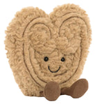 The Jellycat Amuseables Philippe Palmier is a plush brown heart with stitched smile, eyes, and little feet, sitting upright on a white backdrop—perfect for adding charm and comfort to any space.