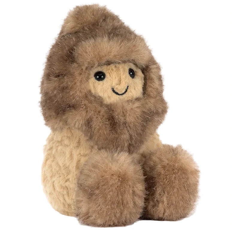 The Jellycat Amuseables Peanut Yeti Outfit is a plush toy with a beige body, fluffy brown hood and mittens, plus black stitched eyes and a small smile.